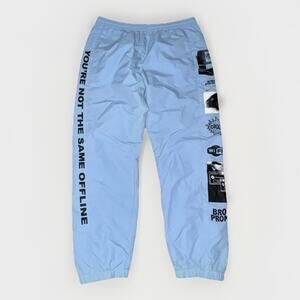 Broken Promises Pants Large Blue Windbreaker Pull On Social Media Print joggers